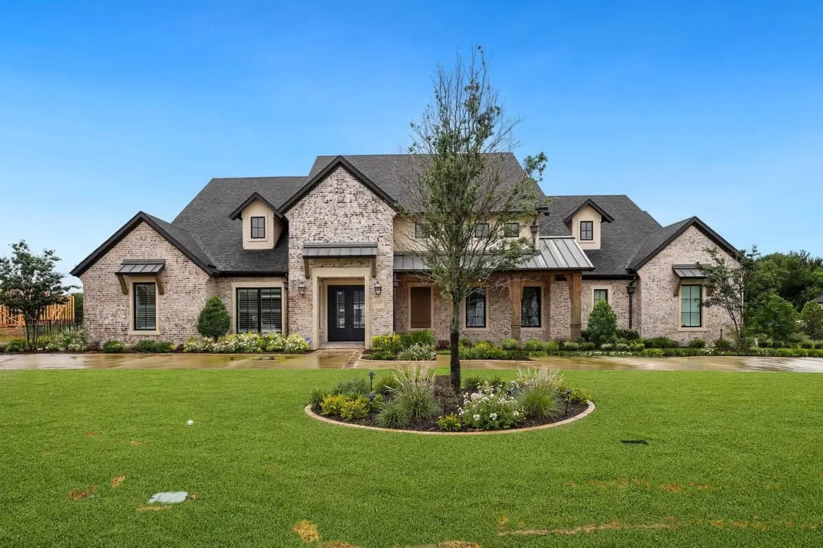 Prosper-area home with a healthy lawn and completed front landscape